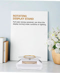 Solar Powered Rotating Display Turntable For Jewelry Phones And Accessories lightweight unit showcasing a gold bracelet on a stylish stand.