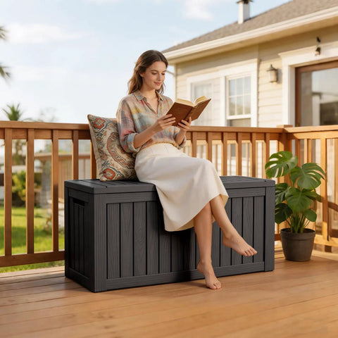 Woman sitting on 90 Gallon Waterproof Deck Box With Lockable Lid For Patio Storage Cushions Pool Gear Garden Tools And Packages Weatherproof Resin Outdoor Storage Bench
