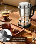 Top Shelf Electric Coffee Grinder And Spice Mill Featuring A Hella Quick 150 Watt Motor Plus Razor Sharp Stainless Steel Blades For Roasted Beans Fresh Herbs Whole Spices And Nuts Boss Cleaning Kit Included on a wooden table.