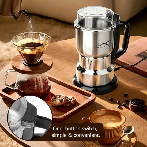 Top Shelf Electric Coffee Grinder And Spice Mill Featuring A Hella Quick 150 Watt Motor Plus Razor Sharp Stainless Steel Blades For Roasted Beans Fresh Herbs Whole Spices And Nuts Boss Cleaning Kit Included on a wooden table.
