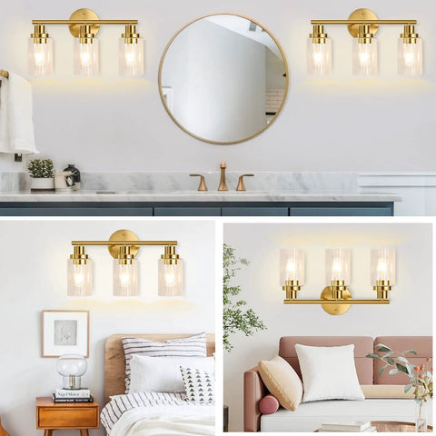 Brushed Brass 3 Light Vanity Fixture With Clear Glass Shades Wall Sconce Vibe above bathroom mirror and bedroom decor.