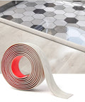 Self Adhesive Vinyl Floor Transition Strip For Laminate And Tile Floors A Flat Divider To Join Gaps And Create A Clean Carpet Threshold Look White Washed Four Feet Long One Point Five Seven Inch Wide Scratch Dirt Resistant Easy Peel And Stick visible between tile and wood floors.