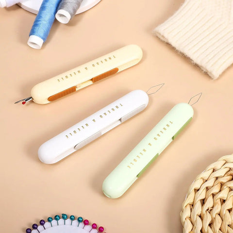Lightweight ABS Needle Threader And Seam Ripper Tool 3 Piece Set In One Dual Head Design For Quick Threading Stitching And Hand Sewing Tasks Super Handy For Crochet And Craft Fans, three ABS tools on beige background