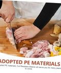 2 Pack Cut Resistant Arm Sleeves Hella Tough Pe Guard worn while slicing meat on a wooden cutting board, showcasing cut safety.