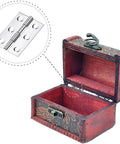 Close-up of stainless steel 2-inch folding hinge for doors/windows with screw holes.