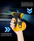 Hand holding Powerful Cordless Electric Air Duster And Blower, yellow and black, showing airflow direction controls.