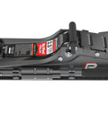 Side view of 2.5-Ton Off-Road Trolley Jack with oversized 4-inch wheels, saddle extension, and integrated handle storage.