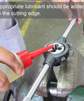 Applying lubricant to M14 X 1.0 Left Hand Thread Die Pro Grade Heavy Duty Alloy Tool Steel in a die stock for threading