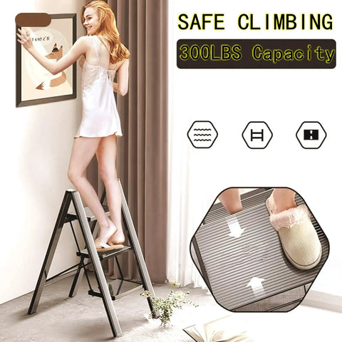 Five Step Folding Step Ladder With Anti Slip Wide Pedal Aluminum Construction Lightweight Portable Stepladder For Home Office Library Workshop And More 300 Lb Capacity Black Non Slip Feet Triangular Frame Boss Level Stability, woman standing on ladder