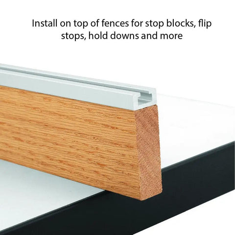 Close-up of 24 Inch Aluminum Mini T Track For Jigs And Fixtures mounted on wood for stop blocks and hold downs.
