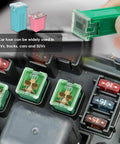 Jcase Fuse Assortment Kit For Trucks Cars And Suvs Contains 36 Heavy Duty Low Profile And Tall Blades rated 20 to 80 Amps installed in a fuse box.