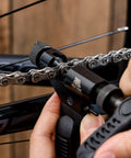 Using Pro Grade Bike Chain Rivet And Breaker Tool With Spare Driving Pin For Fast, Clean Pin Pushes on single-speed chain