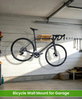 Wood Bike Wall Mount With Shelf And Hooks, all in one road bike storage rack in garage displaying a bike and gear shelf.