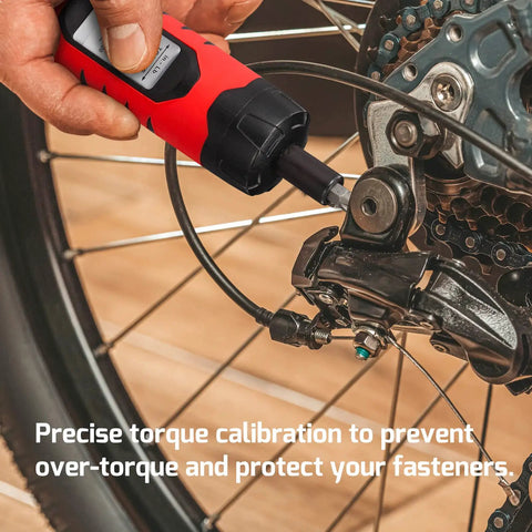 Torque Screwdriver Wrench Set With 29 S2 Alloy Bits And 5 Drive Sockets One Quarter Inch Socket Adapter In Portable Case Gearhead Ready And Precise 10 To 65 Inch Lb Torque Wrench For Bike Auto Electronics DIY Repairs in use on bike wheel