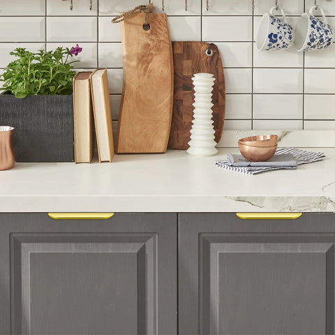 Gold Finger Edge Pulls For Cabinets 10 Pack 150mm Length With 128mm Center To Center 5 Hole Design installed on gray kitchen drawers