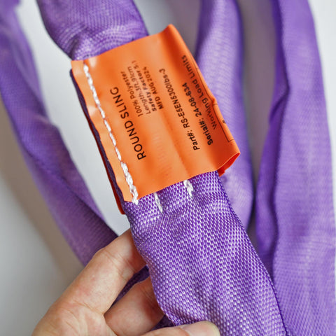 Close-up of Beefy Heavy Duty Round Slings For Aerial Lyra Hoop Rig And Aerial Silks, polyester, purple, with label.