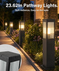 Slick Hardwired Outdoor Pathway Lights E26 Socket 23 Inch Tall in landscaped garden path, showcasing warm 3000K glow.