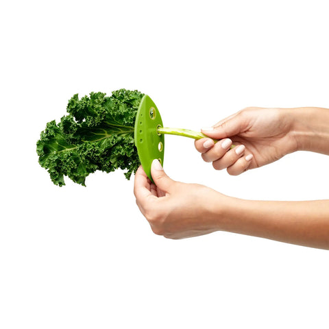 Zero Stress Leaf Stripper For Fresh Kale And Collard Greens With Super Sharp Curved Cutting Edge Quick Herb Chopper Kitchen Gadget in use with kale.
