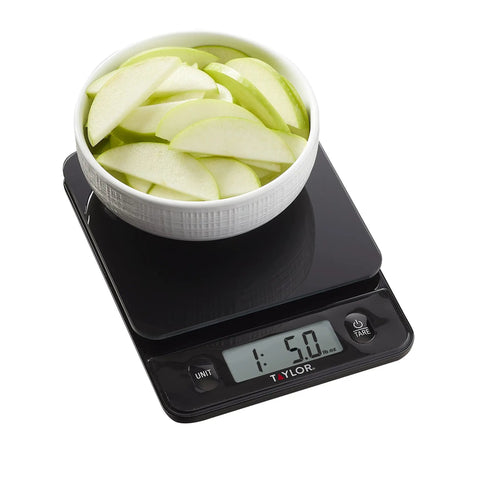 Glass Top Food Scale With Touch Controls 11 lb Capacity Sleek Black Kitchen Scale For Chef Grade Precision Weighing In Grams And Ounces Easy To Use Power On Modern Design And Fast Readouts with bowl of sliced apples