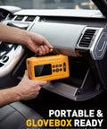 Heavy Duty Cordless Tire Inflator With 160 Psi Automatic Shutoff Digital Gauge And Bright Led Lamp For Trucks and Gear, being placed in a glovebox.