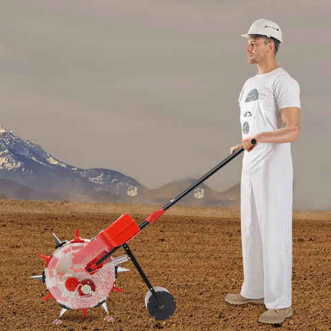 Man using Six Row Manual Seed Planter Push Seeder for Precision Planting Corn, Soybeans, and Peanuts with Galvanized Nozzles.