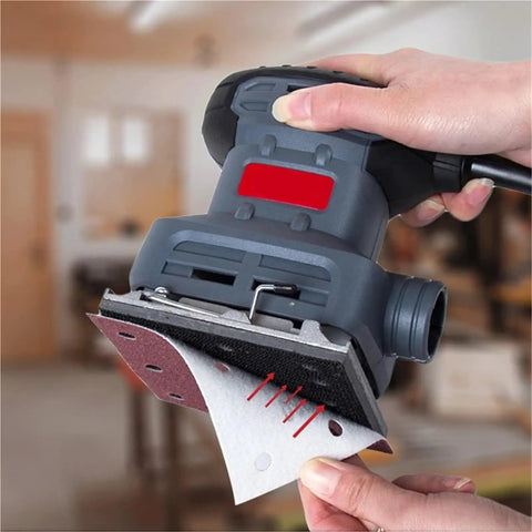 Get This Awesome 20 pc Set of Heavy Duty 115mm Square Sanding Sheets With Eight Holes For Smoothing Wood And Metal Like A Boss attached to a sander.