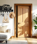 Dope Personalized Key Holder Wall Mount With Custom Name, heavy-duty metal with hooks, mounted in living room next to door.