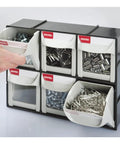 Super Easy Tilt Out Storage Cabinet With Six Smooth Glide Drawer Bins For Small Parts Sorting Stackable Plastic Craft Organizer Box With Quick Connect Modular Rack System Black in use, sorting screws and fasteners.