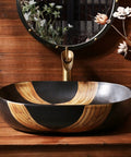 SDVantage Ceramic Bathroom Vessel Sink, Artistic Carved Countertop Basin Sink Black 59 * 40 * 15Cm on wooden surface.