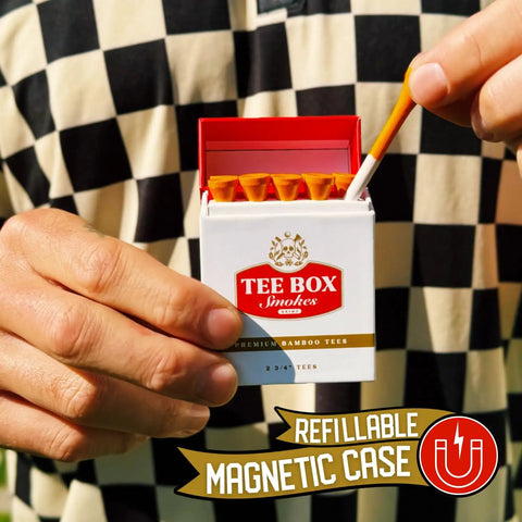 Person holding Tee Box Smokes Premium Bamboo Golf Tees Magnetic Reusable Tee Case Two And Three Quarters Inch Eco Friendly Bamboo Tees