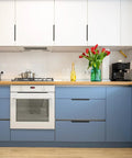 Modern kitchen with Matte White Edge Cabinet Finger Pulls, 10 Pack, 192mm Hole Center, Sleek Modern Hardware installed on blue drawers.