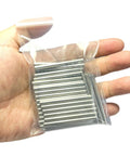 Hand holding a bag of 52 piece 4mm by 50mm dowel pins set in 304 stainless steel built for DIY shelves and bunk beds M4 dowel pins