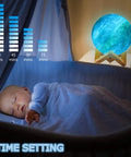 7.0 Inch Moon Lamp Night Light With 16 Color LED beside sleeping baby, showing time settings on wall, remote nearby.
