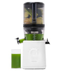 Nama J2 Cold Press Juicer Hands Free White Self Feeding Hopper For Fruits And Vegetables Easy Cleanup with green juice glass.