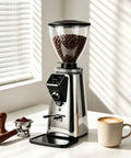 Professional Commercial Coffee Grinder With Programmable Dosage Control And A Massive Seven Hundred Fifty Gram Hopper With Coffee.