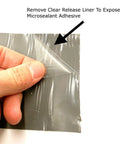 Close-up of hand peeling liner on 4 Inch By 10 Foot RV Roof Sealant Tape That Permanently Stops Leaks, Waterproof And UV Weatherproof Sealant