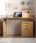 Modern Electric Standing Desk With Hella Spacious Storage And Integrated File Cabinet Featuring Slick Motorized Height Adjustment In Rich Oak Brown, featuring laptop, lamp, and drawers.
