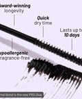 Close-up of the mini wand applicator of Eternal Bond Black No-Fuss Lash Glue showing textured bristles and black smear.