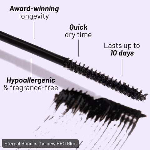Close-up of the mini wand applicator of Eternal Bond Black No-Fuss Lash Glue showing textured bristles and black smear.