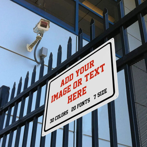 Rock Solid Kickin Custom Metal Signs For Your Biz Or Home Base Featuring Hassle Free Mounting And Weather Resistant Coating for a customized wall sign on a black fence.