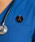 Thin Line First Responder Lapel Pin Tie Tack Three Quarter Inch Copper Tone Metal Pinback Honoring Law Enforcement Firefighters EMTs Paramedics Dispatchers Corrections And Other Frontline Heroes With Classic 1920s Style Design on nurse's uniform.