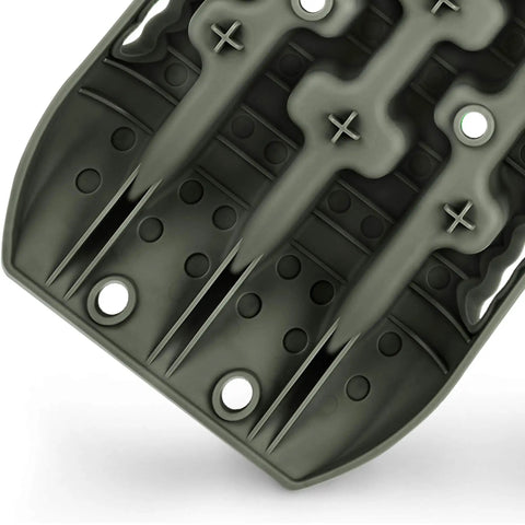 Close-up of olive reinforced nylon Recovery Traction Tracks Tire Ladder for off road sand snow mud 4WD tough trails