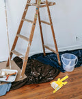 Smooth As Glass Paint Edger Roller Kit With Extra Sleeve For Crisp Wall Edges And Zero Paint Runoff on a painter's setup with ladder.
