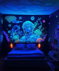 Room lit with Ultra Bright LED Black Light Bulb 10W UVA 385 400nm A19, glowing wall poster and decorative elements for parties.