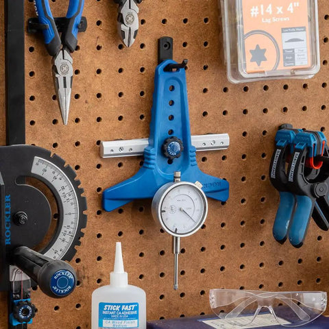 Table Saw Alignment Gauge With Precision Dial Indicator For Perfect Parallel Cuts, wall-mounted, blue color, tools visible