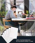 Person writing at desk with plants, next to 5x8 Legal Pads For Work And School, 80 GSM Paper, College Ruled Notepads, 6 Pack
