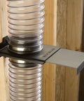 StableGate With Bracket Dust Gate, Two And A Half Inch, wall mounted, heavy duty ABS plastic, attached to wall with hoses.