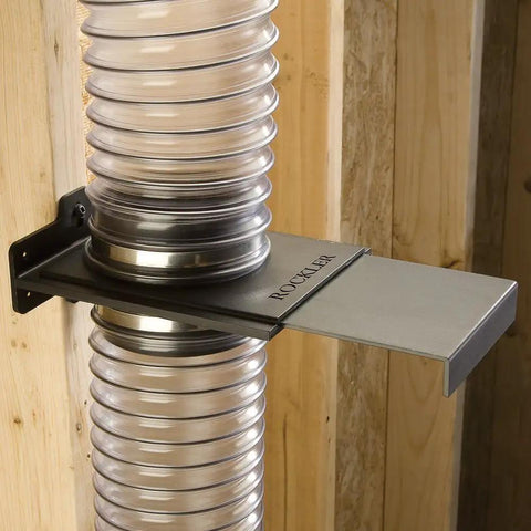 StableGate With Bracket Dust Gate, Two And A Half Inch, wall mounted, heavy duty ABS plastic, attached to wall with hoses.