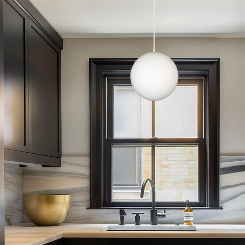 10 Inch Mid Century Modern Globe Pendant Light With Frosted Glass Orb, White Finish, hanging in a stylish kitchen