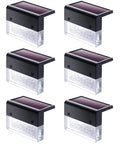 Six black and transparent Solar Deck Lights 3000K Warm White Color Changing Outdoor Fence Lights for steps and rails.